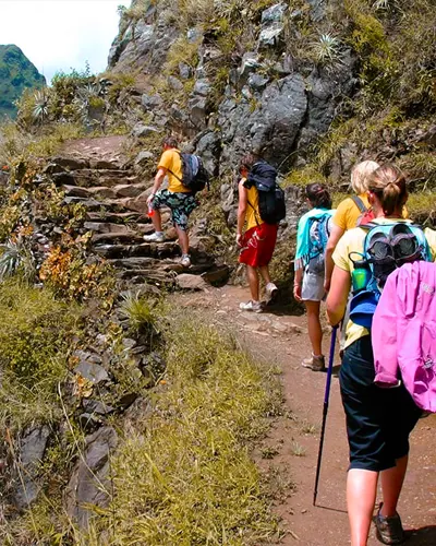 Tourists walking along a section of the Inca Trail to Machu Picchu